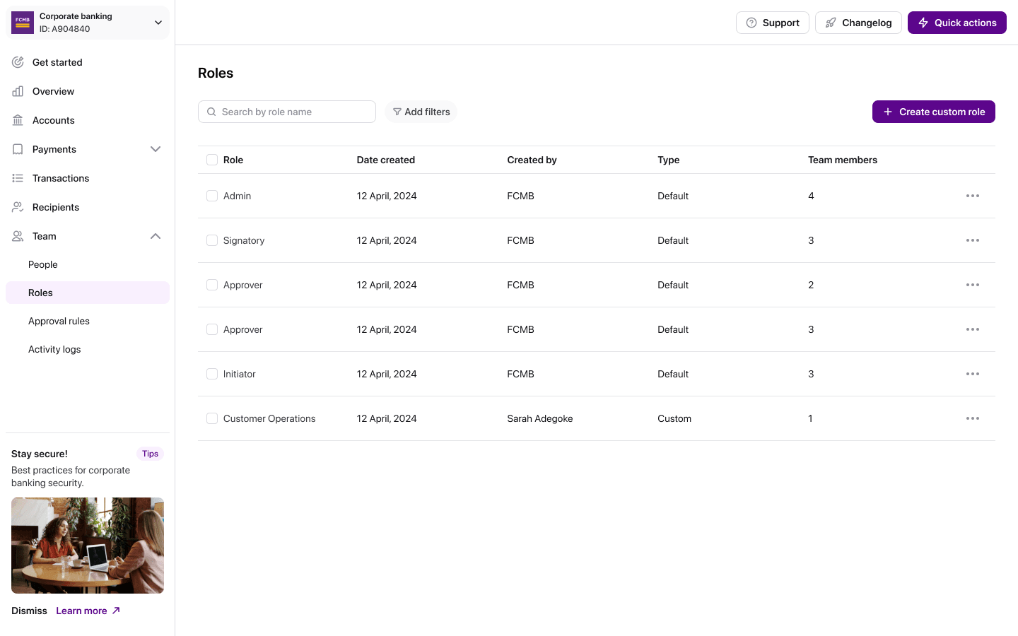 Roles screen listing default roles alongside a custom role created by the client.